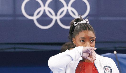 美國體操選手比拉絲因心理困擾突然宣布退賽，翁健輝認為並非壞事，指正視心理健康十分重要。（新華社）
